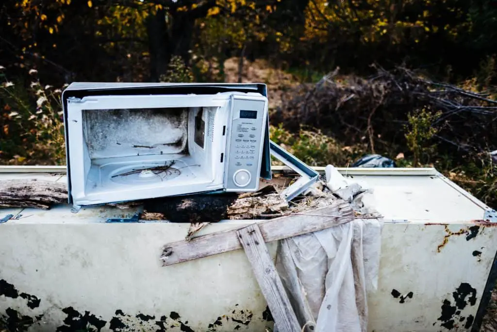 microwave in the trash